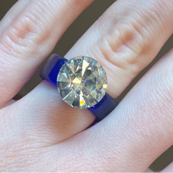 Fun Plastic Party Ring With Blue Band And Large Gem